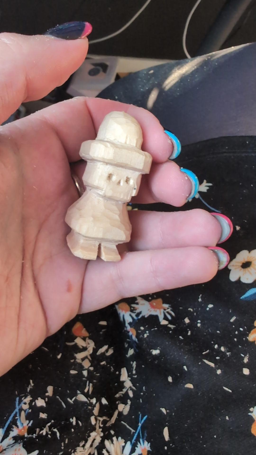 Raw wood carving of the little guy.