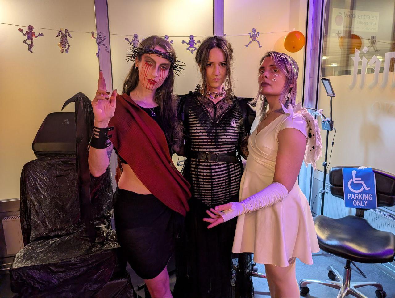 Ash posing with friends at another party.