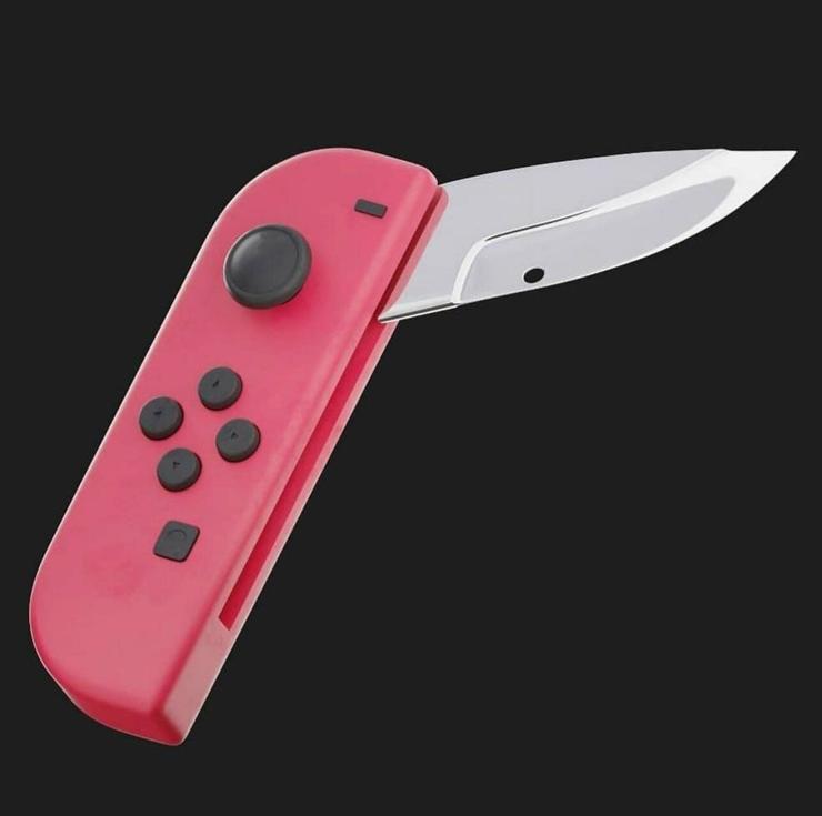 Picture of a red Nintendo joycon with a knife blade 