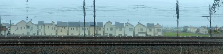 A weird panorama of squashed houses